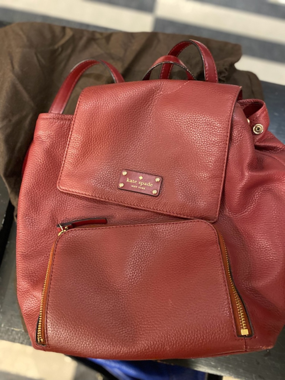 kate spade Burgundy Pebbled Leather Backpack with Gold Hardware